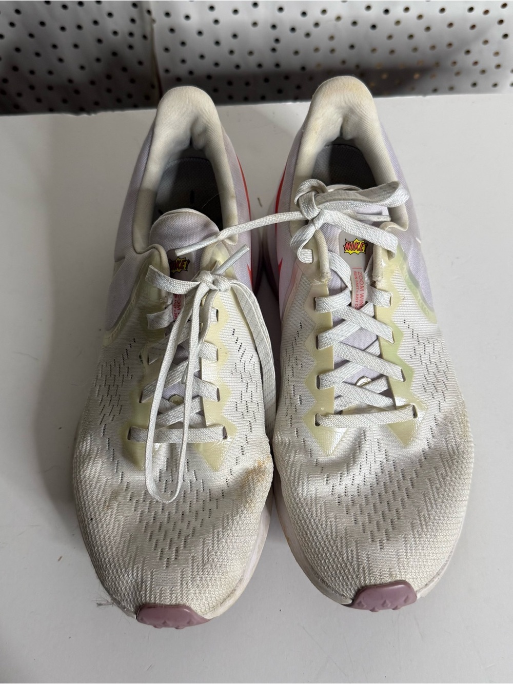 Nike Women’s Running Sneakers in White, Pink, and Pale Yellow